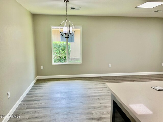 bedroom with ceiling fan and light hardwood / wood-style flooring