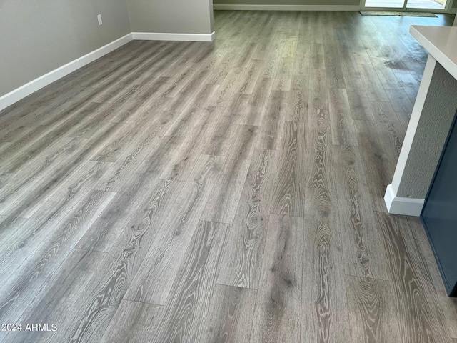 room details with wood finished floors and baseboards