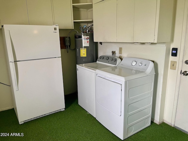 laundry area with cabinet space, washing machine and dryer, and electric water heater