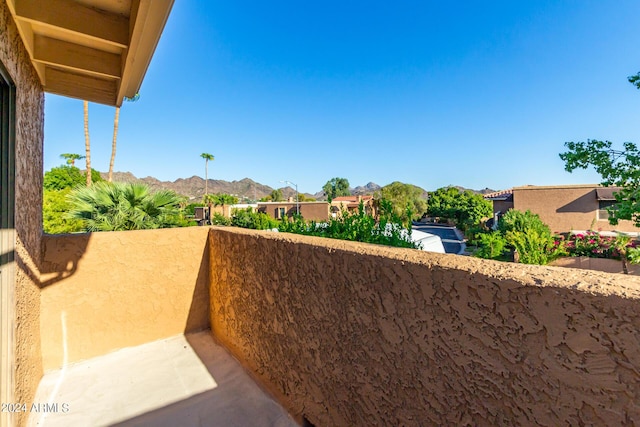 balcony featuring a mountain view