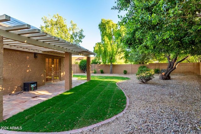 view of yard featuring a pergola and a patio area