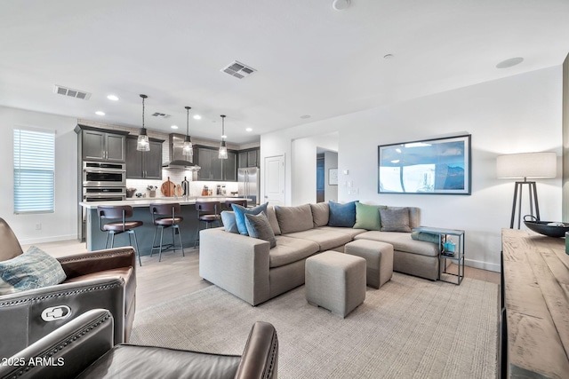 living room featuring light hardwood / wood-style flooring