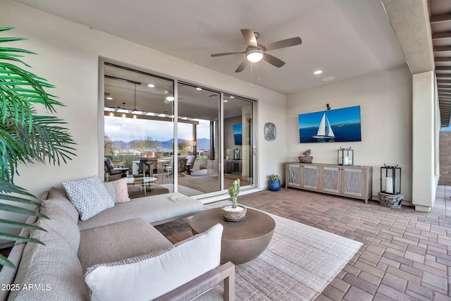 view of patio with an outdoor hangout area and ceiling fan