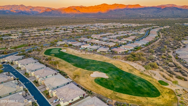 aerial view at dusk with a mountain view