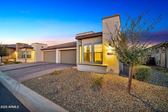 view of front of property featuring a garage