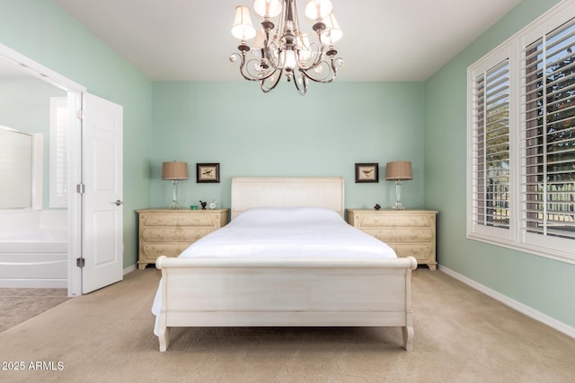 bedroom with a chandelier, light colored carpet, and baseboards