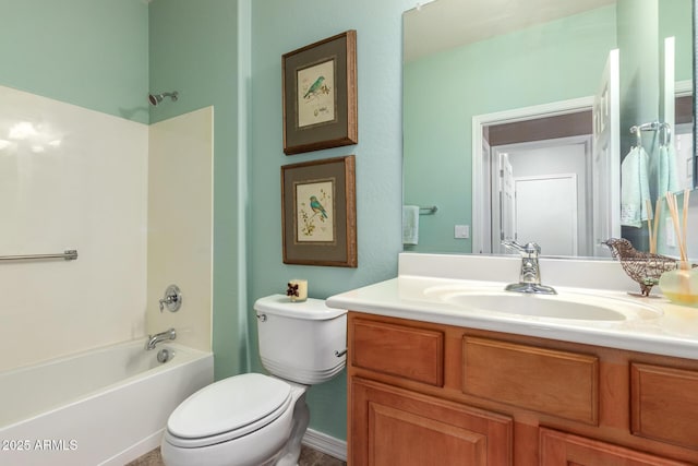 bathroom featuring toilet, washtub / shower combination, and vanity