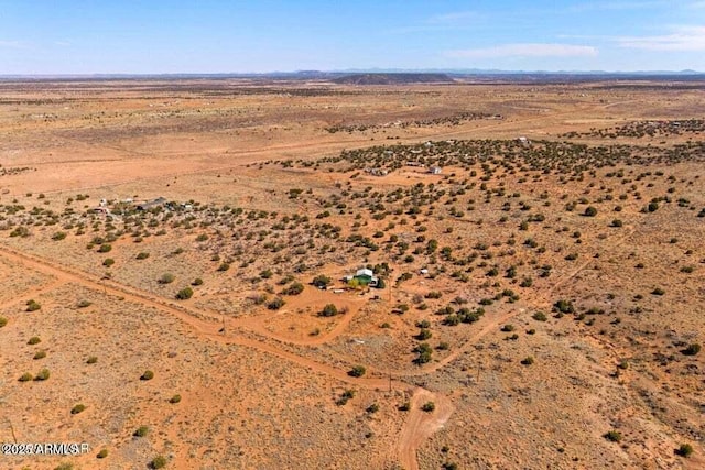 aerial view featuring a rural view and view of desert