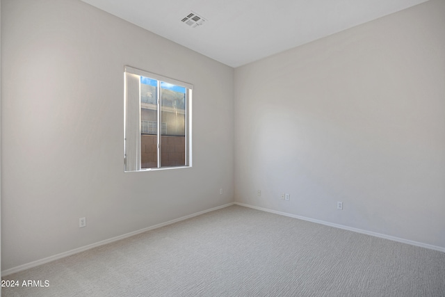 empty room featuring carpet flooring