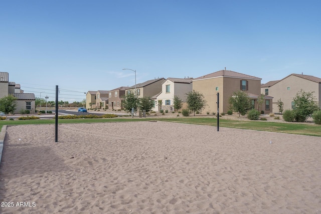 view of home's community with volleyball court