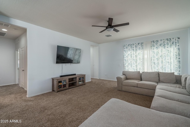 living room with carpet and ceiling fan