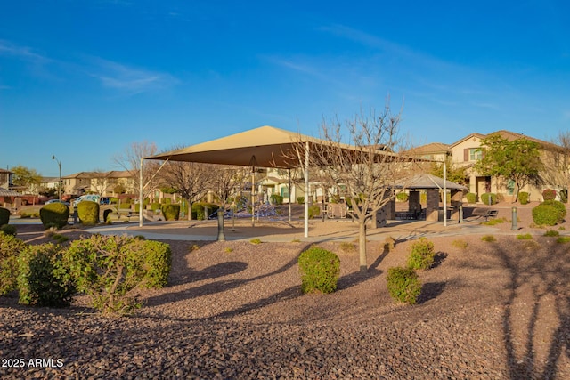 surrounding community with a residential view and a gazebo