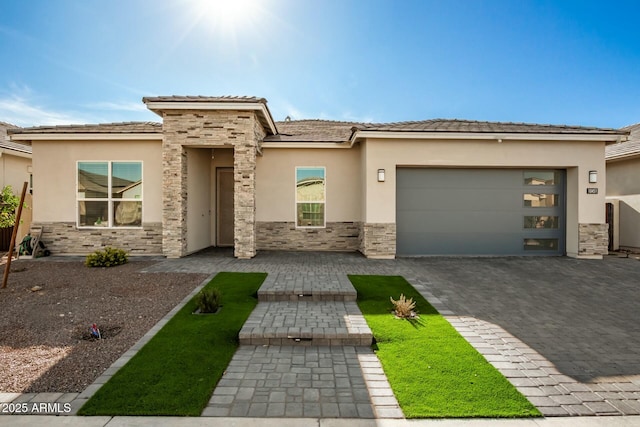 prairie-style house featuring a garage