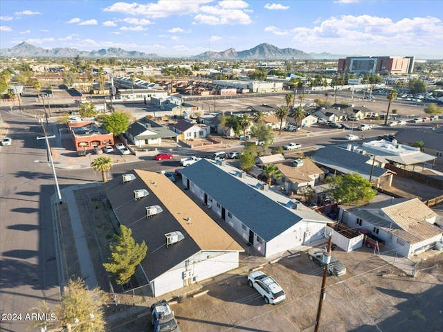 birds eye view of property with a mountain view