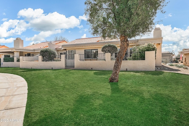 view of front of property with a fenced front yard, a gate, stucco siding, a front lawn, and a chimney