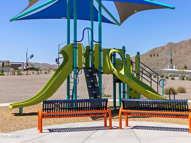 communal playground with a mountain view