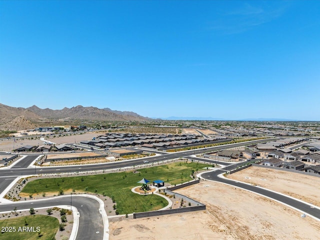birds eye view of property with a residential view and a mountain view