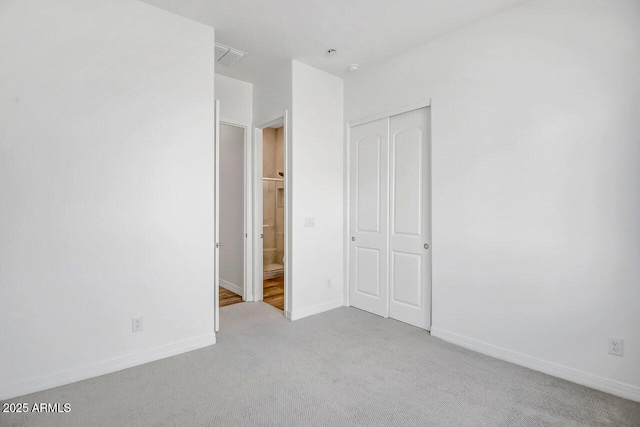 3310 Iron King Cir, Prescott, AZ 86301 - unfurnished bedroom with a closet, carpet flooring, visible vents, and baseboards
