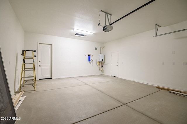 3310 Iron King Cir, Prescott, AZ 86301 - garage featuring water heater and a garage door opener