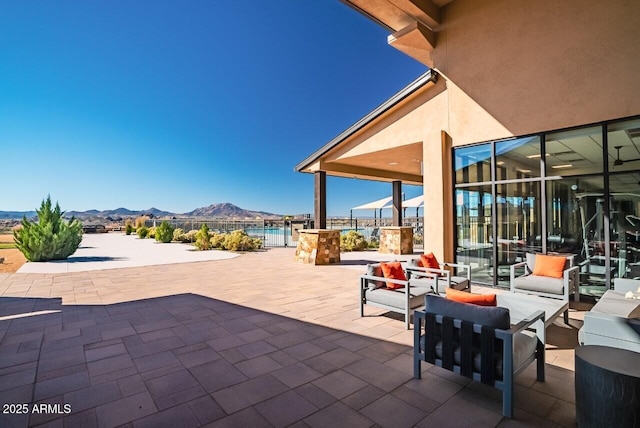 3310 Iron King Cir, Prescott, AZ 86301 - view of patio / terrace with a mountain view and an outdoor hangout area