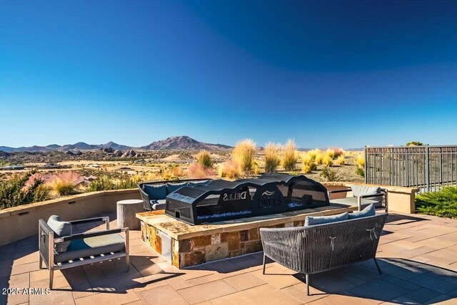 3310 Iron King Cir, Prescott, AZ 86301 - view of patio featuring a mountain view and an outdoor hangout area