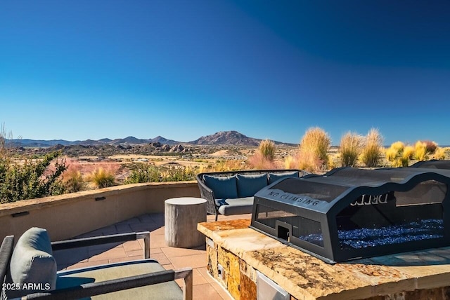 3310 Iron King Cir, Prescott, AZ 86301 - view of patio / terrace featuring a mountain view and an outdoor hangout area