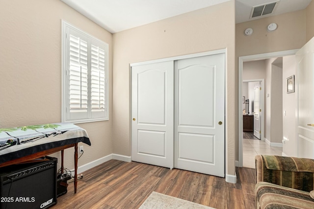 interior space with dark hardwood / wood-style floors