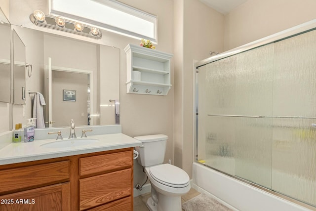 full bathroom with enclosed tub / shower combo, tile patterned floors, toilet, and vanity