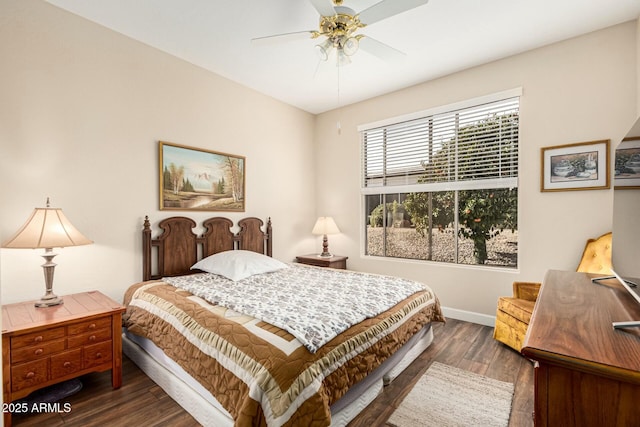 bedroom featuring dark wood-type flooring and ceiling fan