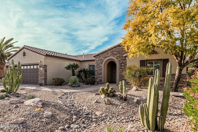 view of front of property featuring a garage