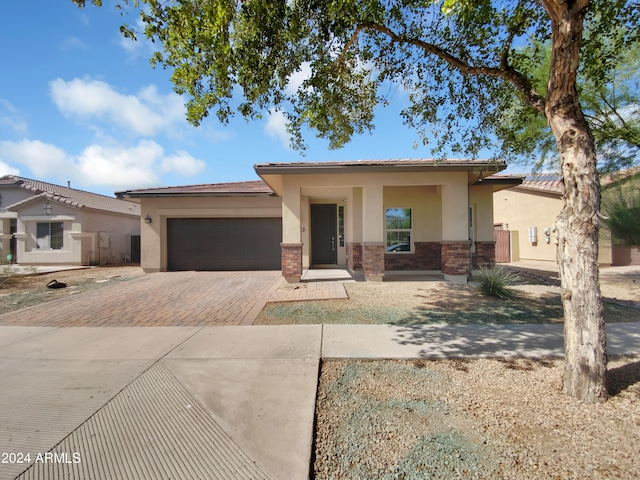 view of front of home with a garage