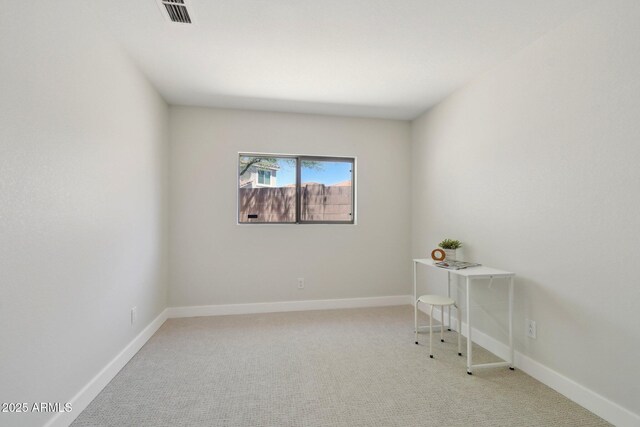 7500 E Deer Valley Rd Unit 132, Scottsdale, AZ 85255 - unfurnished room featuring light carpet and baseboards