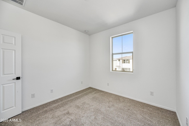 7423 W Cavalier Dr, Glendale, AZ 85303 - empty room featuring carpet floors and baseboards