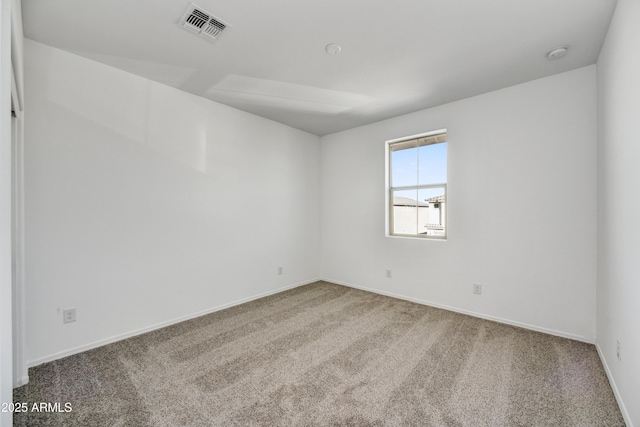 7423 W Cavalier Dr, Glendale, AZ 85303 - empty room featuring carpet flooring, baseboards, and a smoke detector