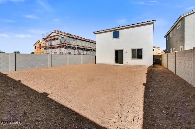 7423 W Cavalier Dr, Glendale, AZ 85303 - rear view of property with a fenced backyard and stucco siding