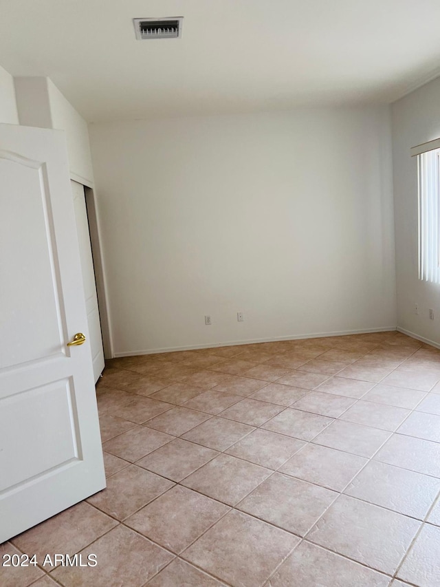 view of tiled spare room