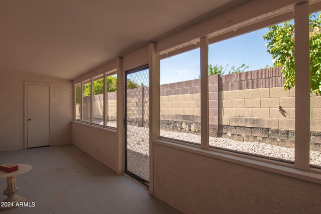 unfurnished sunroom with a healthy amount of sunlight