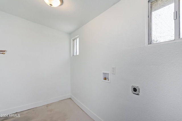 laundry area featuring hookup for an electric dryer and hookup for a washing machine