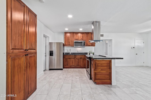 kitchen featuring kitchen peninsula, sink, stainless steel appliances, and island range hood