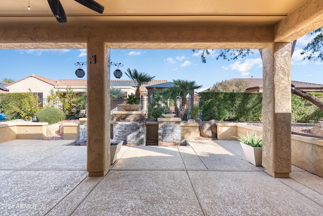 view of patio with a ceiling fan and a fenced backyard