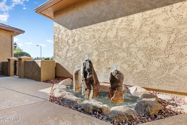 details featuring stucco siding