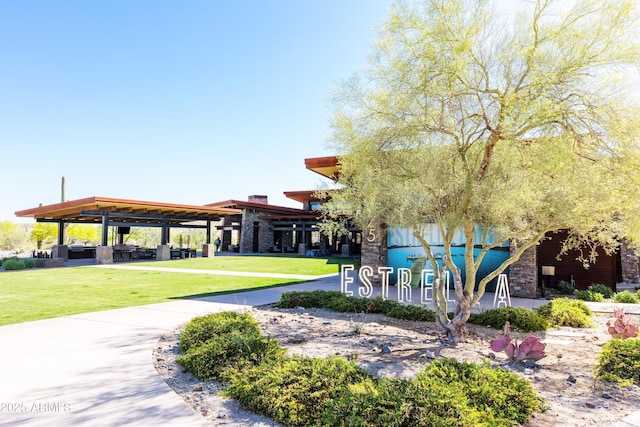 18322 W Thistle Landing Dr, Goodyear, AZ 85338 - view of home's community featuring a lawn