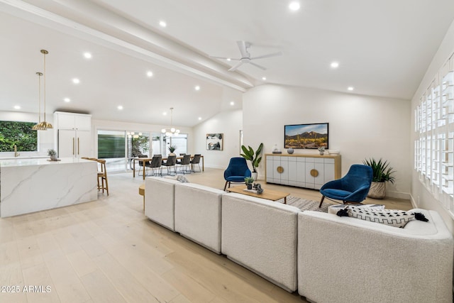 living area featuring recessed lighting, a ceiling fan, light wood-style floors, and vaulted ceiling