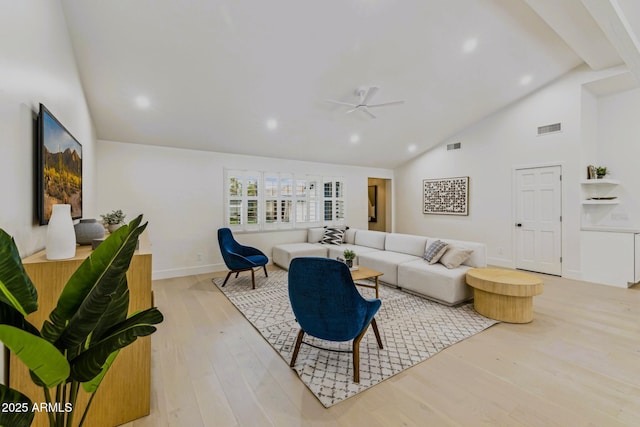 living room with light wood-type flooring, visible vents, high vaulted ceiling, baseboards, and ceiling fan