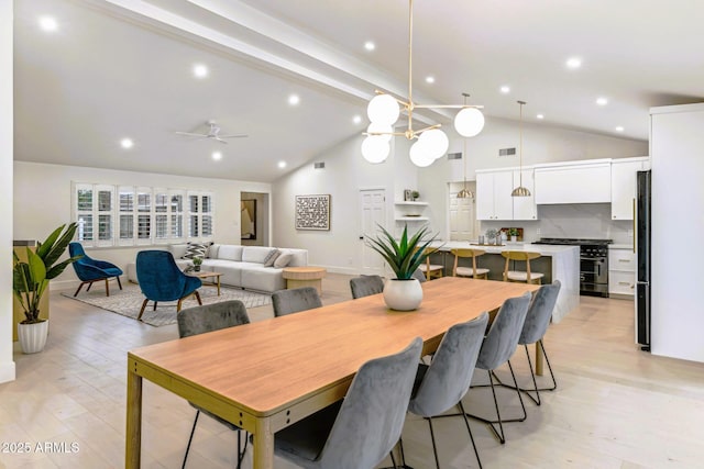 dining area with visible vents, beam ceiling, light wood-style floors, and a ceiling fan