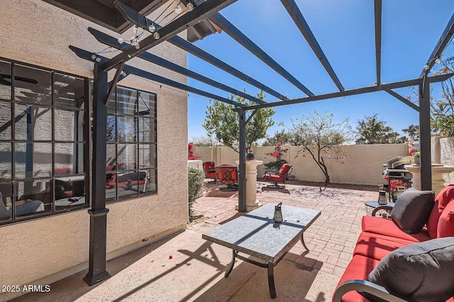 view of patio / terrace featuring a fenced backyard and a pergola