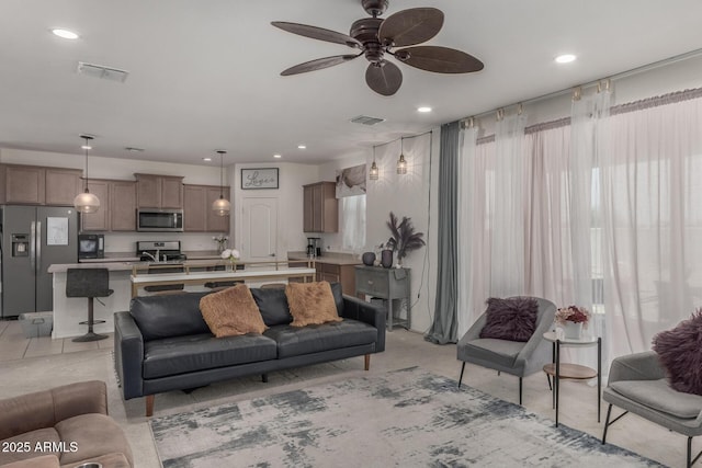 4010 W Coles Rd, Laveen, AZ 85339 - living area featuring a ceiling fan and recessed lighting