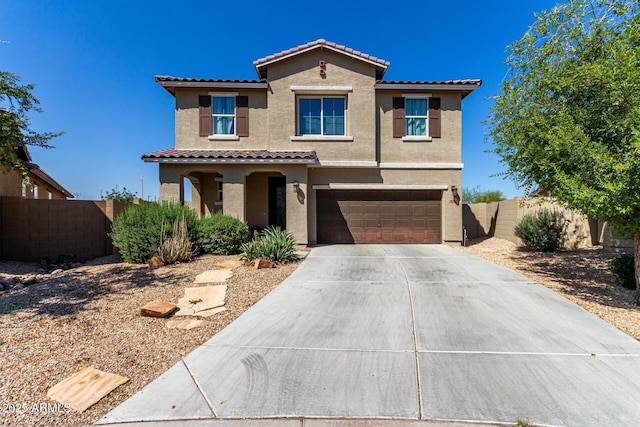 4010 W Coles Rd, Laveen, AZ 85339 - view of front of house with a tiled roof, stucco siding, an attached garage, and concrete driveway