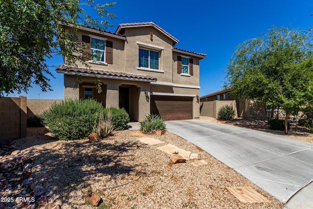 4010 W Coles Rd, Laveen, AZ 85339 - view of front facade with a tiled roof, stucco siding, an attached garage, and concrete driveway