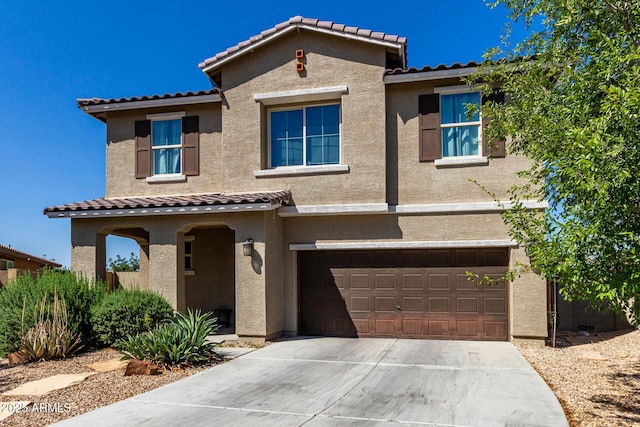 4010 W Coles Rd, Laveen, AZ 85339 - view of front of house featuring a tile roof, stucco siding, and an attached garage